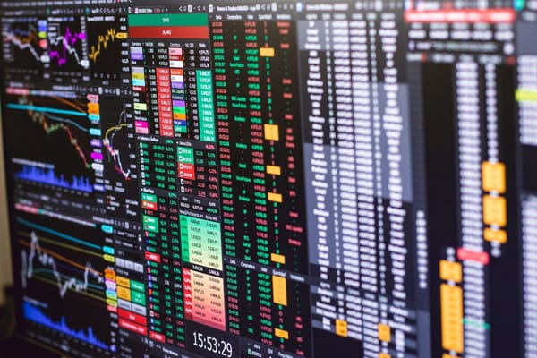 Options Trading for UK Investors: How Covered Calls and Cash-Secured Puts Actually Work — and What HMRC Does With the Premium